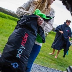 Dryrobe Compression Travel Bag -Professional surf equipment store dryrobe travel compression bag action